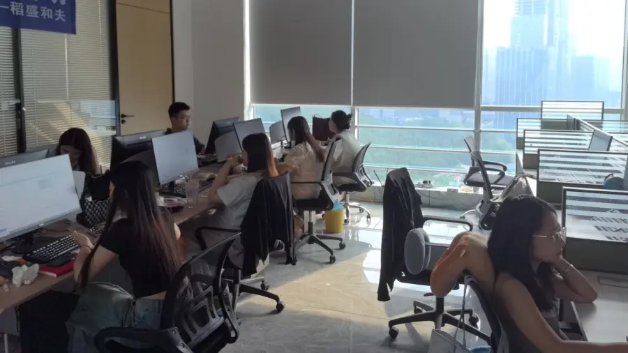 BatFlags™ in-house design team checking custom flag artwork