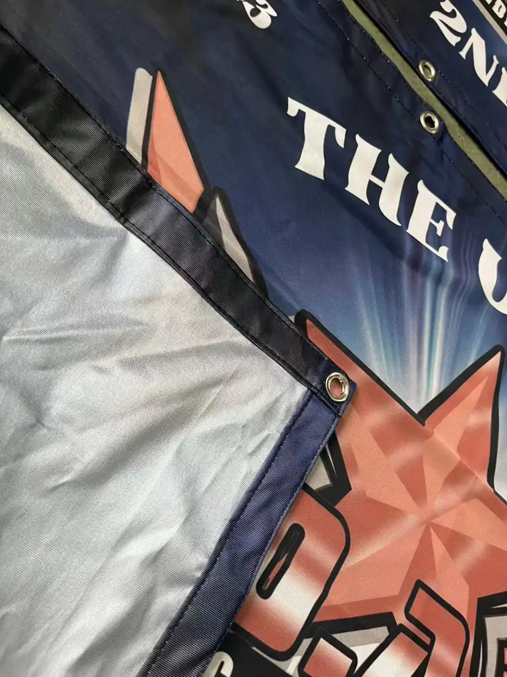 Close-up of heavyweight opaque banner fabric with full-color printing