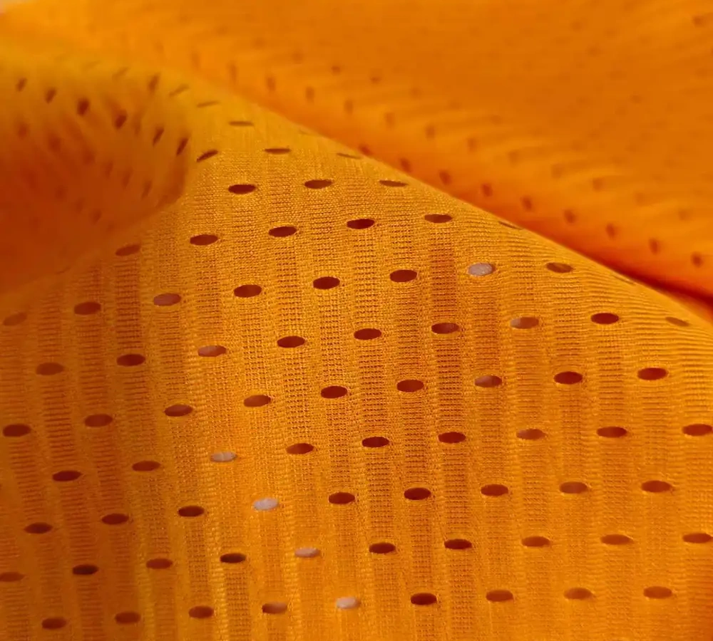 Close-up of perforated mesh banner fabric designed to allow airflow