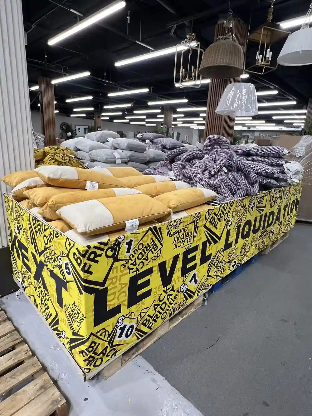 Indoor promotional banner installed around a large pillow display